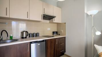Studio, Balcony | Private kitchenette