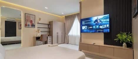 Family Apartment, Balcony, City View | Desk, laptop workspace, blackout drapes, soundproofing