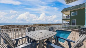 Outdoor dining - 6BR Gulf-front home, Sleeps 15 ~ Private heated pool (Gulf Shores)