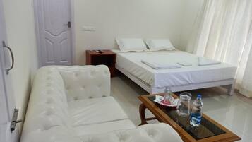 Klassieke kamer, uitzicht op resort | Woonruimte