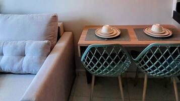 Apartamento conforto, sacada | Área de estar