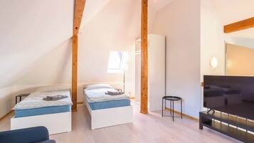 Fer et planche Ă repasser, lit parapluie, Wi-Fi, draps fournis