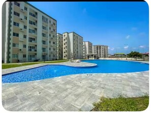 Outdoor pool - Elegant Resort Retreat: Pool - Security - Balcony! (Sakumono)