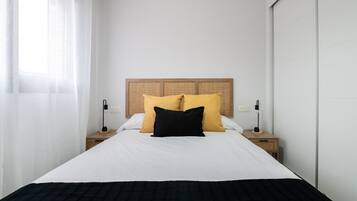 2 dormitorios, tabla de planchar con plancha, cuna de viaje y wifi