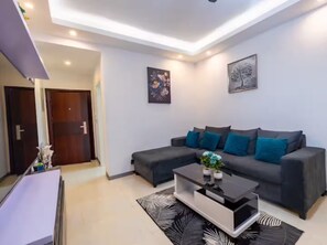 Living area - Trendy & Safe Oasis: Pool, Balcony, Parking, WiFi! (Sakumono)