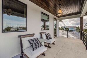 Terrace/patio - Calypso Current by Exclusive Vacations is a luxury new construction home in the (Anna Maria)