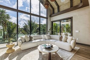 Smart TV, offices - Calypso Current by Exclusive Vacations is a luxury new construction home in the (Anna Maria)