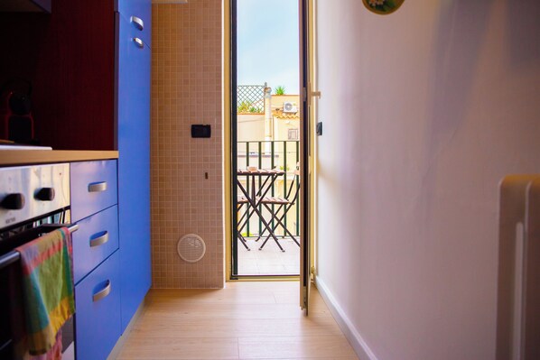 Apartamento, vista para o mar | Cozinha privada