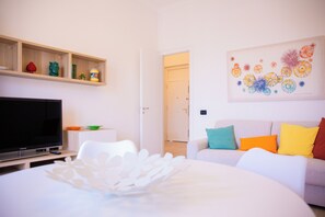 Appartement, uitzicht op zee | Woonruimte