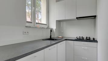 Appartamento | Angolo cottura privato | Macchina per tè/caffè, bollitore elettrico