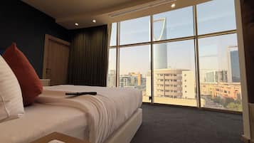 Junior Suite, 1 King Bed | Minibar, desk, laptop workspace, blackout drapes