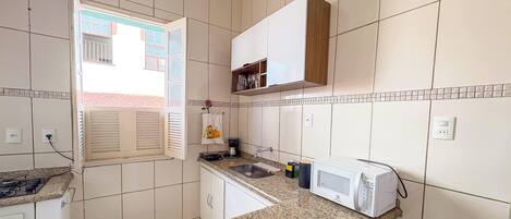 Fridge, microwave, coffee/tea maker, toaster