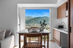 Panoramic Studio, Balcony, Partial Sea View | Dining room - Amazing Apartments - Hotel Zone (Puerto Vallarta)