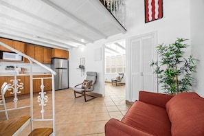 Standard Apartment | Living area | 32-inch Smart TV with digital channels - Casa Brisa by Otium (Aguada)