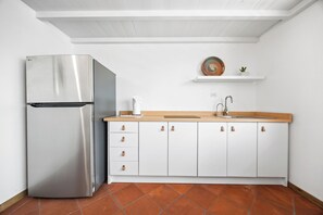 Standard Apartment | Private kitchen | Fridge, stovetop, cookware/dishes/utensils - Casa Brisa by Otium (Aguada)