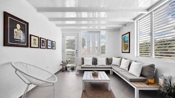 Standard Apartment | Living area | 32-inch Smart TV with digital channels