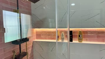 Shower, hair dryer, towels, soap
