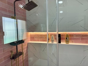 Shower, hair dryer, towels, soap