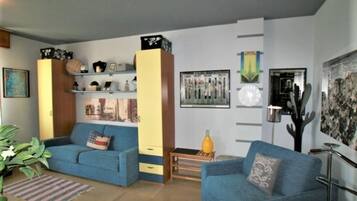 Studio, Multiple Bedrooms, Balcony, City View | Living room