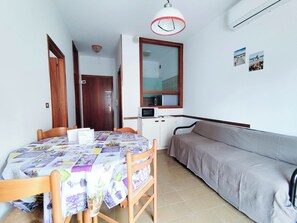 Apartment, 1 Bedroom, Balcony, City View | Dining room - Seaside Apartment With Balcony (Jesolo)