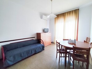 Apartment, 1 Bedroom, Balcony, City View | Living room - Apartment With Balcony on the Seafront (Jesolo)