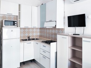 Apartamento, 1 quarto, sacada, vista para a cidade | Parte interna