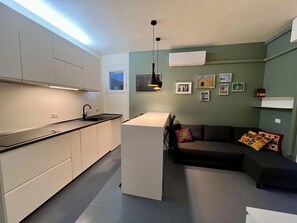 Apartment, Balcony, City View | Living room - Cozy Studio With Pool Access (Jesolo)