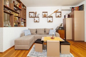 Living area - Romantic studio apartment just 650 metres from the beach with sea views, gym (Crikvenica)
