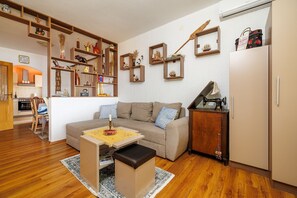 Living area - Romantic studio apartment just 650 metres from the beach with sea views, gym (Crikvenica)