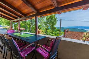 Outdoor dining - Dog-friendly villa with sea view, private pool, Mediterranean garden (Grižane)