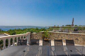 Outdoor dining - Luxury villa with private pool, hot tub, sea view, billiards, fitness equipment, garage (Crikvenica)