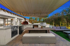 Outdoor dining - Carefree Casa: Resort-Style Home w/Heated Pool+Spa, Arcade, Pizza Oven & Casita (Indio)