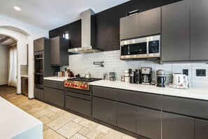 Fridge, microwave, oven, stovetop - Carefree Casa: Resort-Style Home w/Heated Pool+Spa, Arcade, Pizza Oven & Casita (Indio)