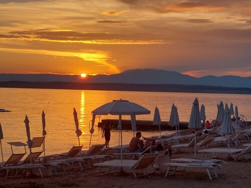 Romantic apartment just 500 metres from the beach with private balcony