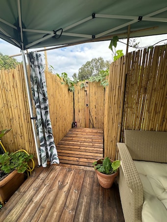 Terrace/patio. A Peaceful Caravan Stay in the Moshav