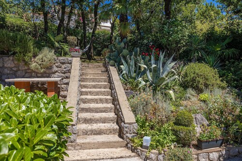 Impressive holiday home just 80 metres from the beach with Mediterranean garden and chill-out area