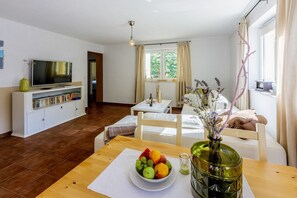 Living area - Charming apartment with Mediterranean garden, pool, high chair, cot, BBQ (Tribalj)