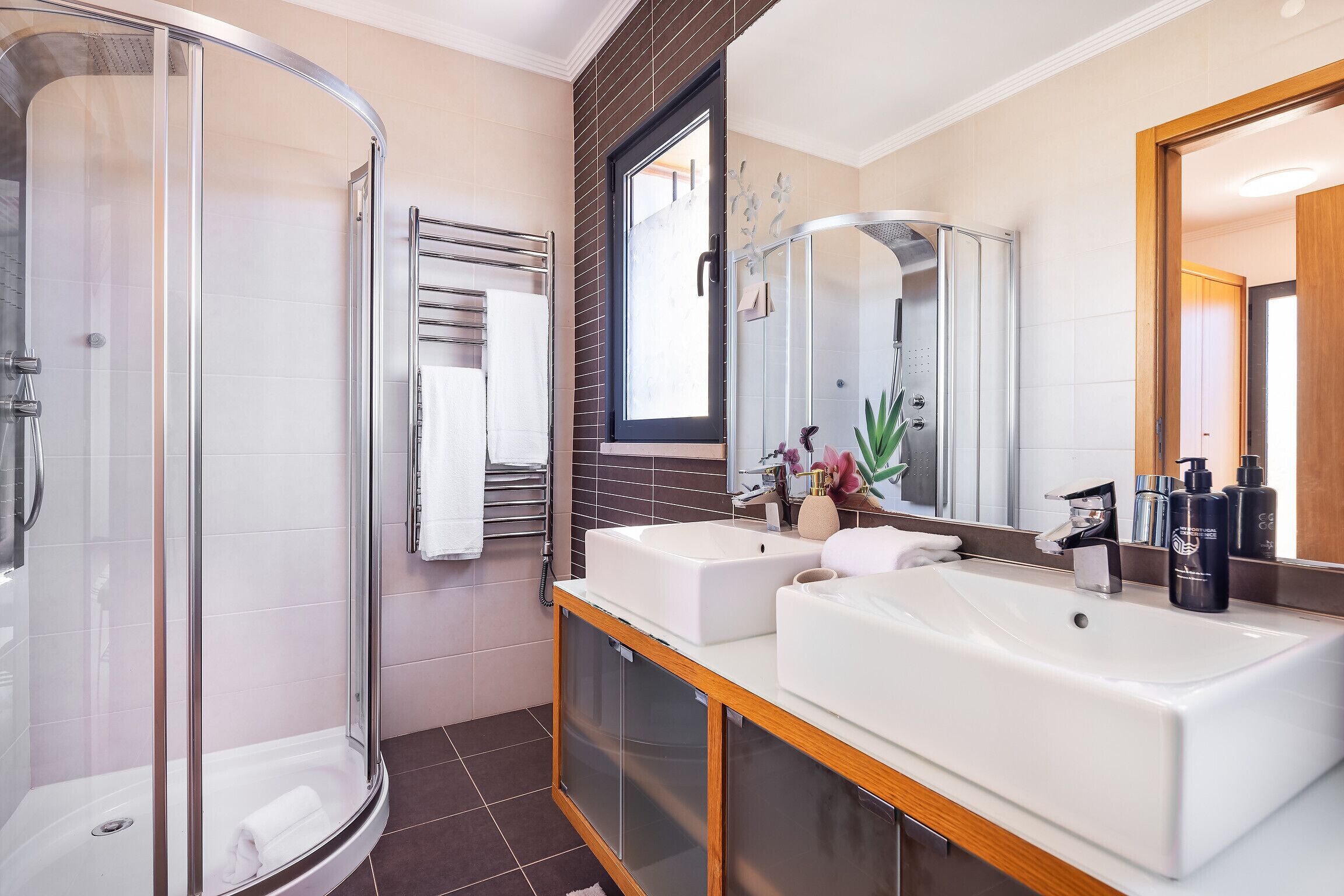 Shower, hair dryer, towels, shampoo