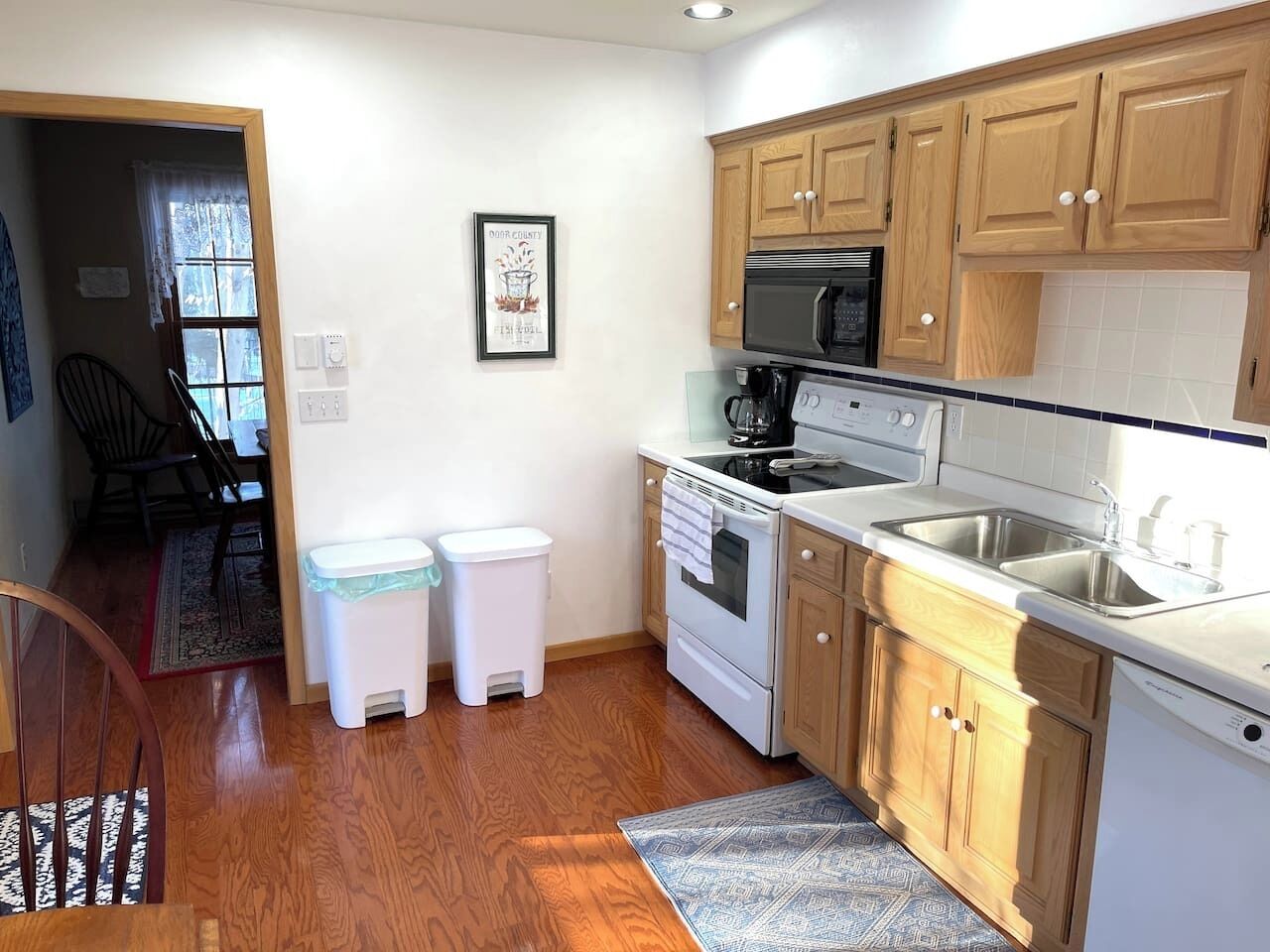 Fridge, coffee/tea maker, cookware/dishes/utensils