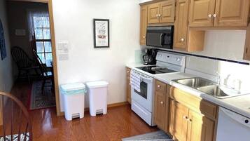 Fridge, coffee/tea maker, cookware/dishes/utensils