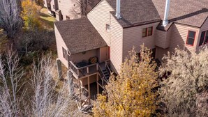 A residential area with multiple houses featuring pitched roofs and chimneys. - Rustic In-Town Retreat | Pool | Hot Tub (Durango)
