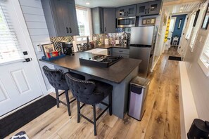 Fridge, microwave, oven, stovetop - Hagrid's Hut - Harry Potter Riverfront Experience (New Richmond)