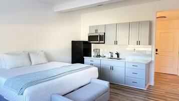 1 habitación, tabla de planchar con plancha, cuna de viaje y wifi