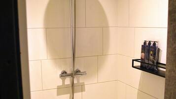 Shower, eco-friendly toiletries, hair dryer, towels