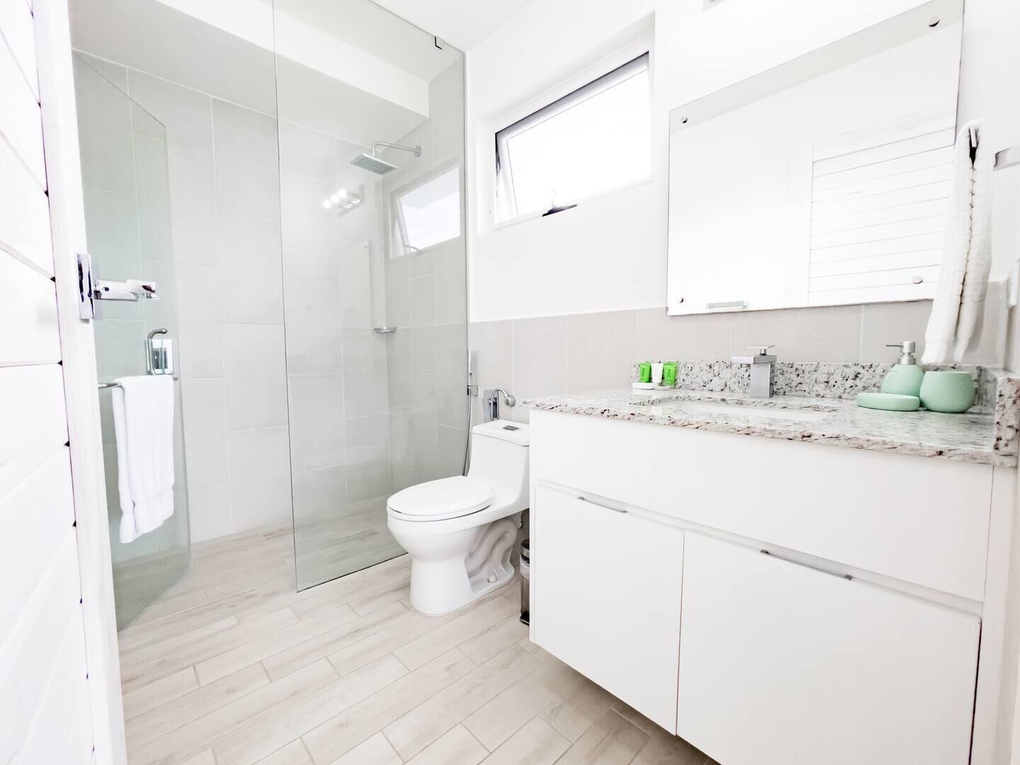 Shower, hair dryer, towels, soap