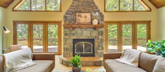 NEW LISTING! KAYAKS + PADDLE BOARDS. Timber Ridge Lake House is a private home in Amery Wisconsin on Lake Wapogasset. The home balances the warmth of a large A-Frame with modern decor and finishes providing a serene stay with woods and lake views.