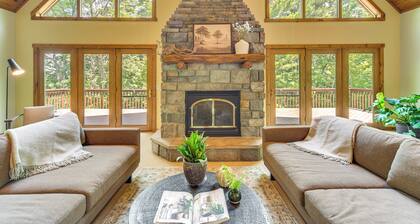 NEW LISTING! Timber Ridge Lake House is a private lake home in Amery Wisconsin on Lake Wapogasset. The home balances the warmth of a large A-Frame with modern decor and finishes providing a serene stay with woods and lake views.