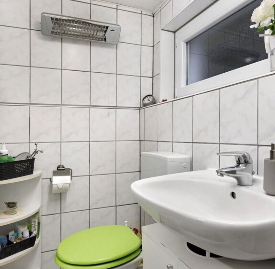 Shower, hair dryer, towels, toilet paper