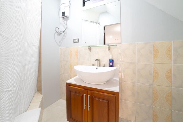 Shower, towels, soap, toilet paper