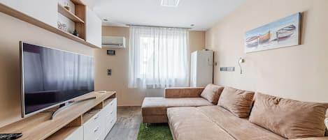 Apartment, 2 Bedrooms | Living area | Flat-screen TV
